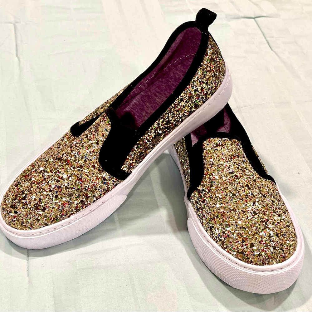 Slightly worn gold slip ons